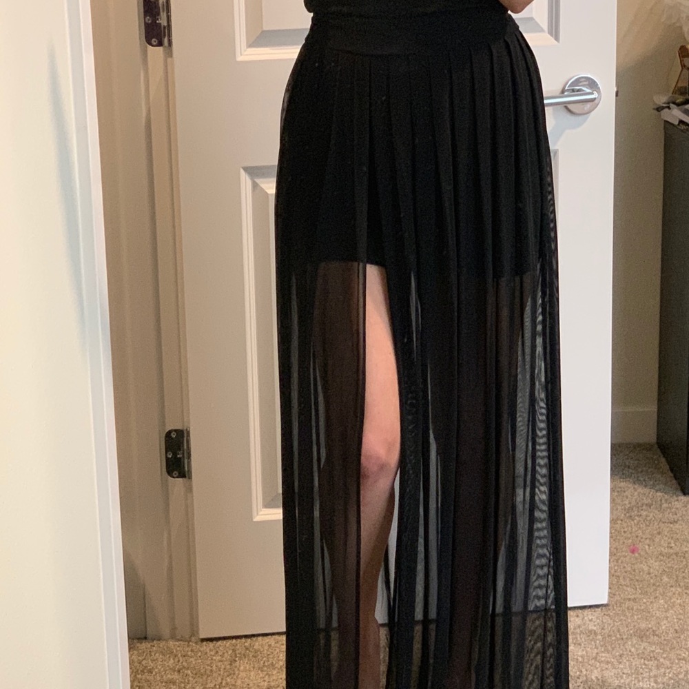 Black mini skirt with sheer black overlay